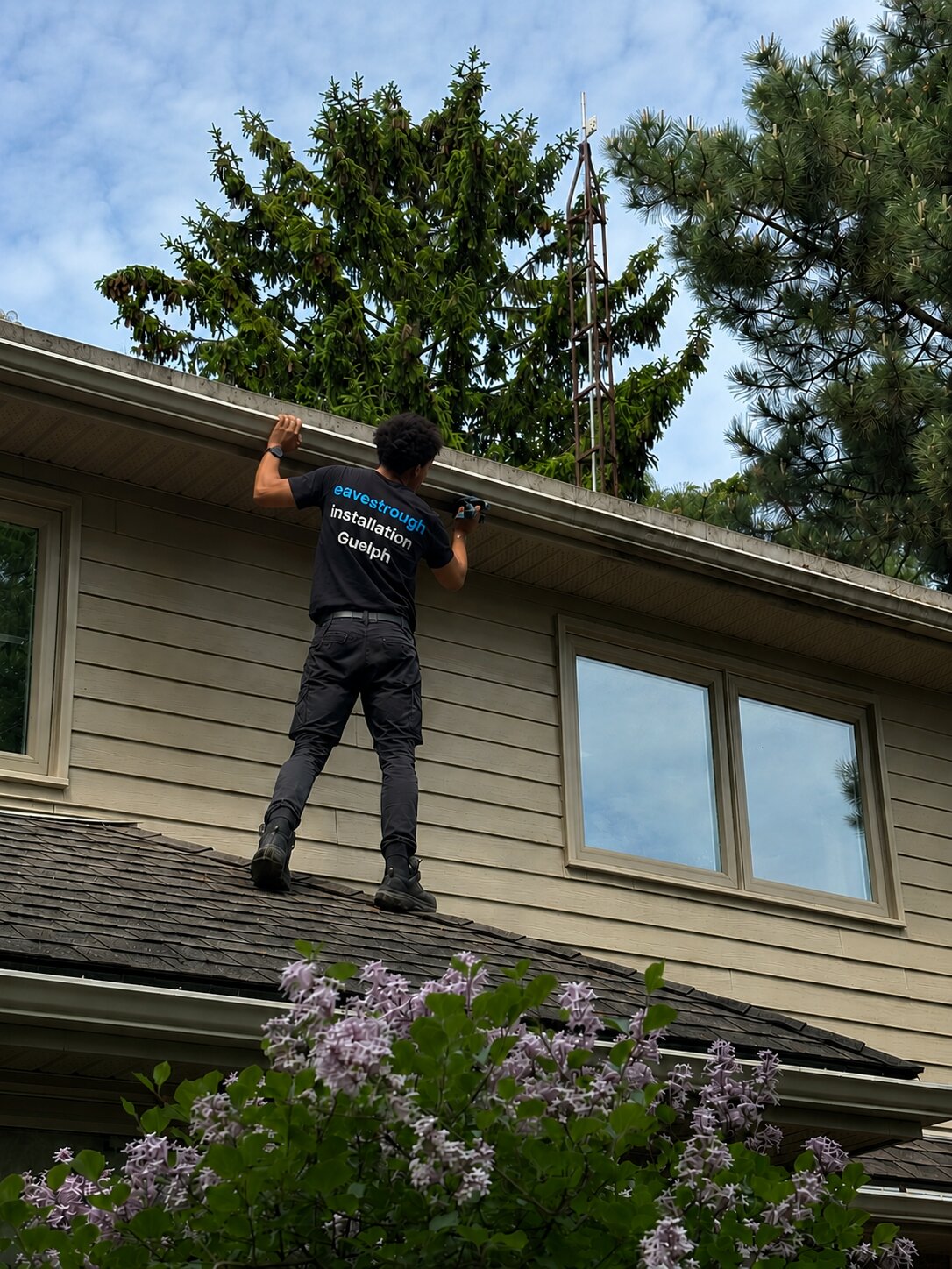 Eavestrough Installation Guelph crew working on a roofline