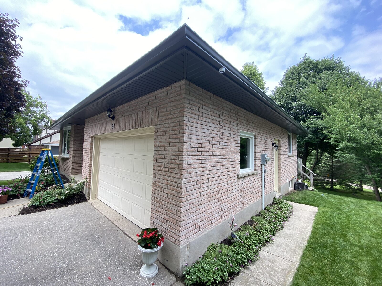 Eavestrough after repair complete, Guelph